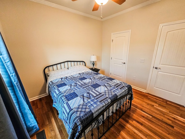 300 Woodson Dr, Tullahoma, TN 37388 - bedroom with wood finished floors, ornamental molding, baseboards, and a ceiling fan