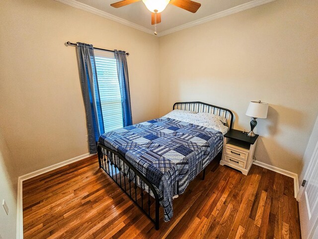 300 Woodson Dr, Tullahoma, TN 37388 - bedroom featuring dark wood-style floors, crown molding, baseboards, and ceiling fan