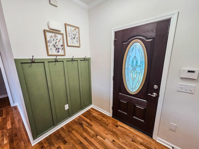 300 Woodson Dr, Tullahoma, TN 37388 - foyer featuring crown molding, dark wood-style flooring, and baseboards