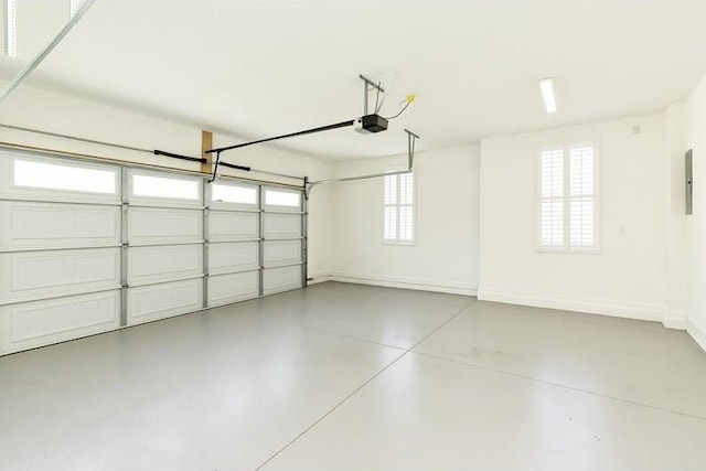 611 Lake Reserve Cv, Hermitage, TN 37076 - garage featuring baseboards and a garage door opener