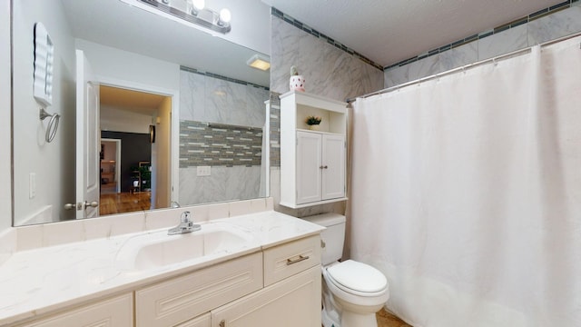 1807 Mosley Ferry Rd, Chapmansboro, TN 37035 - full bathroom with toilet, vanity, and curtained shower