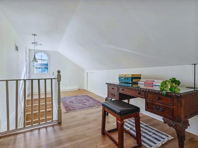 816 Charles Pl, Memphis, TN 38112 - home office featuring vaulted ceiling, wood finished floors, and baseboards