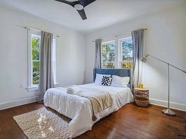 816 Charles Pl, Memphis, TN 38112 - bedroom with baseboards, wood-type flooring, and ceiling fan