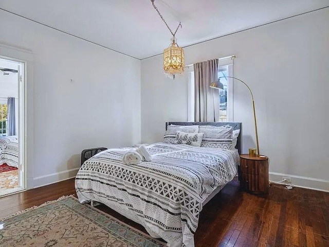 816 Charles Pl, Memphis, TN 38112 - bedroom with baseboards and hardwood / wood-style floors