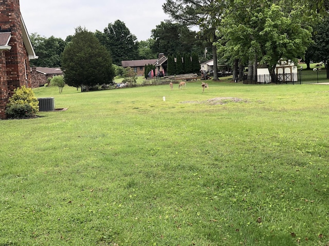 2026 Saundersville Ferry Rd, Mount Juliet, TN 37122 - view of yard with central air condition unit and view of wooded area