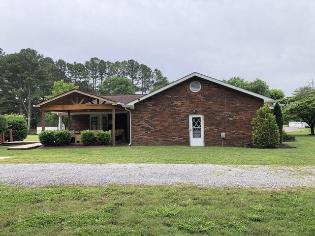 2026 Saundersville Ferry Rd, Mount Juliet, TN 37122 - view of front of home with a front yard and brick siding