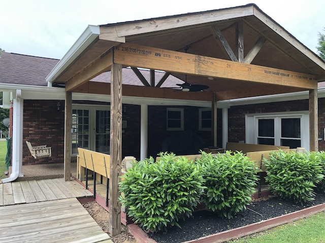2026 Saundersville Ferry Rd, Mount Juliet, TN 37122 - back of property with ceiling fan, a wooden deck, and roof with shingles
