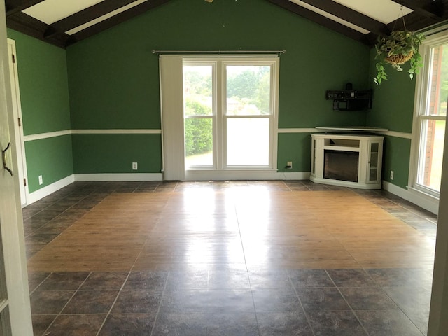 2026 Saundersville Ferry Rd, Mount Juliet, TN 37122 - unfurnished living room featuring healthy amount of natural light, baseboards, and a fireplace