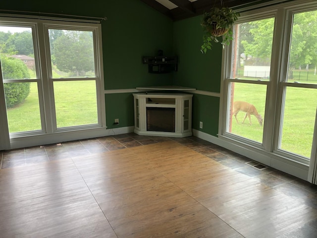 2026 Saundersville Ferry Rd, Mount Juliet, TN 37122 - unfurnished living room featuring lofted ceiling and baseboards