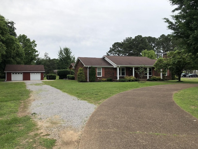 2026 Saundersville Ferry Rd, Mount Juliet, TN 37122 - single story home featuring an outbuilding, a front yard, a garage, driveway, and brick siding