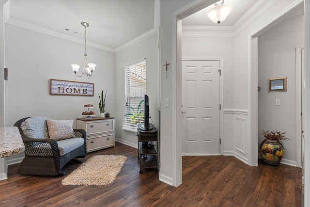 1763 Humphreys Gln, Spring Hill, TN 37174 - living area featuring dark wood-style floors, crown molding, a chandelier, and baseboards