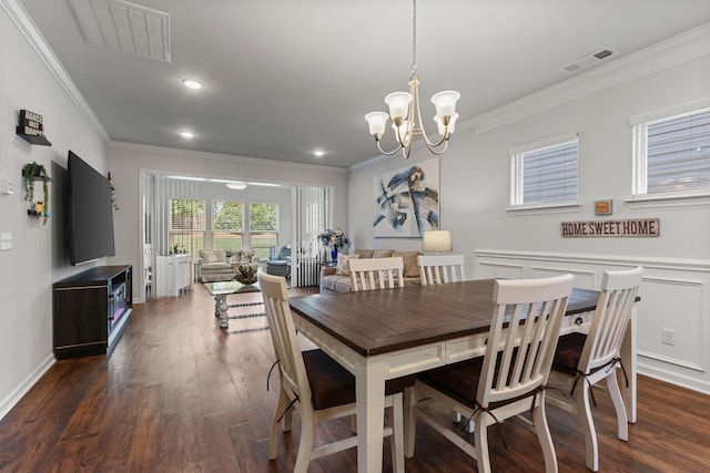 1763 Humphreys Gln, Spring Hill, TN 37174 - dining space featuring crown molding, dark wood-style floors, a chandelier, and recessed lighting