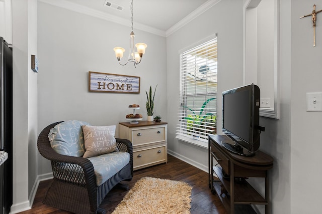 1763 Humphreys Gln, Spring Hill, TN 37174 - living area with ornamental molding, dark wood finished floors, a chandelier, and baseboards