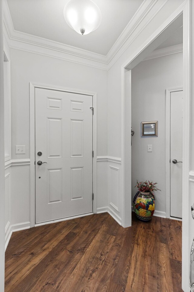 1763 Humphreys Gln, Spring Hill, TN 37174 - foyer entrance with dark wood-style floors and ornamental molding