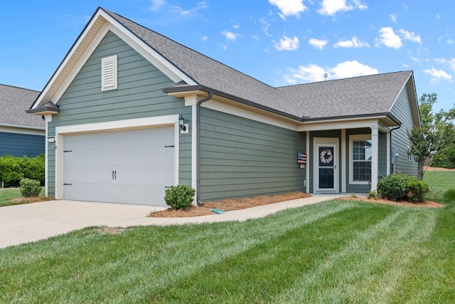 1763 Humphreys Gln, Spring Hill, TN 37174 - view of front of property with driveway, an attached garage, a front lawn, and roof with shingles