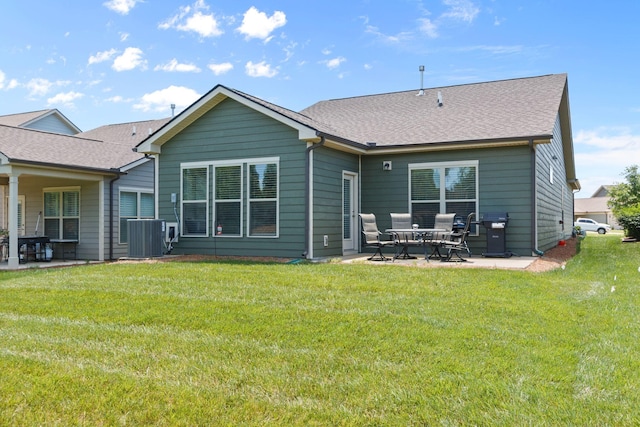 1763 Humphreys Gln, Spring Hill, TN 37174 - back of property with a patio area, central AC, a lawn, and a shingled roof