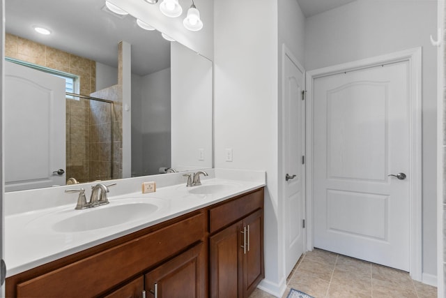 1763 Humphreys Gln, Spring Hill, TN 37174 - full bathroom with double vanity, a tile shower, and tile patterned floors