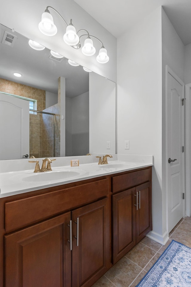 1763 Humphreys Gln, Spring Hill, TN 37174 - bathroom with double vanity, a stall shower, and tile patterned floors