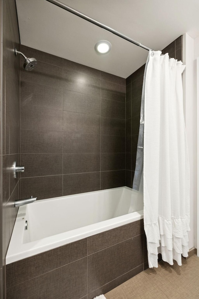 1212 Laurel St Unit 615, Nashville, TN 37203 - full bathroom featuring tiled shower / bath combo and recessed lighting