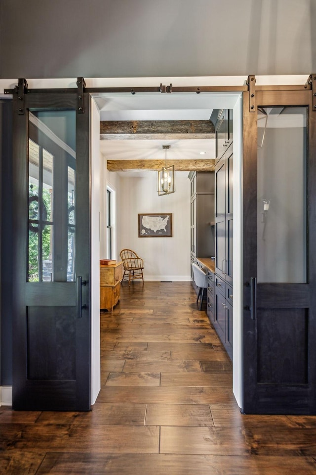 3166 Tanyard Hollow Rd, Culleoka, TN 38451 - entryway featuring a barn door, baseboards, dark wood-style flooring, beamed ceiling, and a chandelier