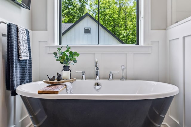 3166 Tanyard Hollow Rd, Culleoka, TN 38451 - bathroom featuring a soaking tub and healthy amount of natural light