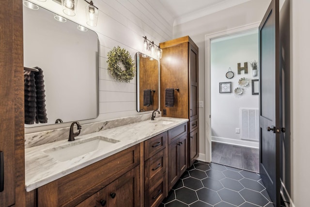 3166 Tanyard Hollow Rd, Culleoka, TN 38451 - bathroom with double vanity, tile patterned floors, and baseboards