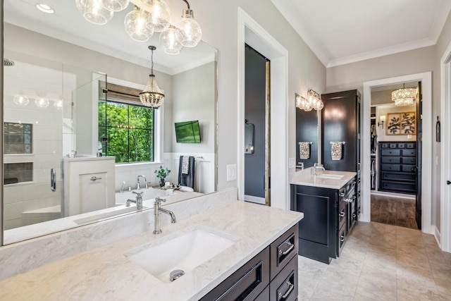3166 Tanyard Hollow Rd, Culleoka, TN 38451 - full bathroom with a chandelier, a shower stall, two vanities, ornamental molding, and a bath