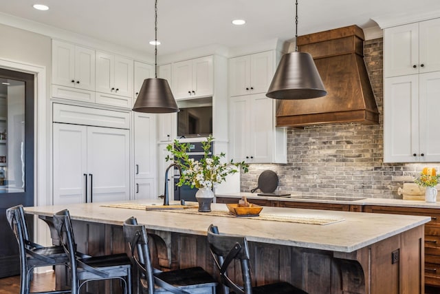 3166 Tanyard Hollow Rd, Culleoka, TN 38451 - kitchen with tasteful backsplash, pendant lighting, a breakfast bar, and recessed lighting