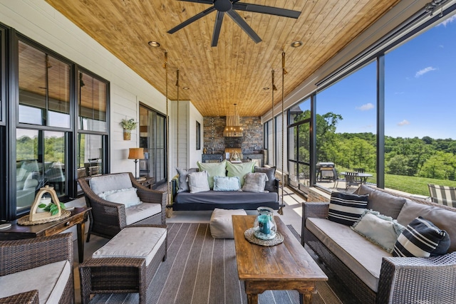 3166 Tanyard Hollow Rd, Culleoka, TN 38451 - sunroom featuring a ceiling fan and an outdoor hangout area