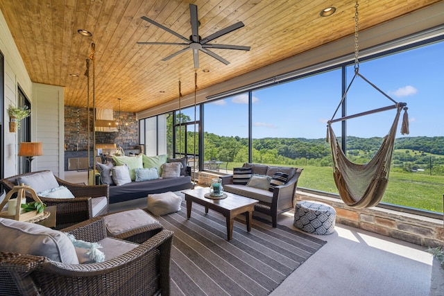 3166 Tanyard Hollow Rd, Culleoka, TN 38451 - sunroom featuring an outdoor hangout area and ceiling fan