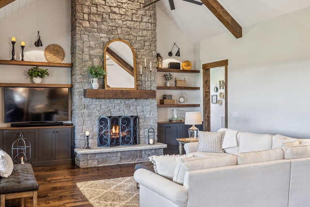 3166 Tanyard Hollow Rd, Culleoka, TN 38451 - living area featuring dark wood-style flooring, beam ceiling, a fireplace, a ceiling fan, and high vaulted ceiling