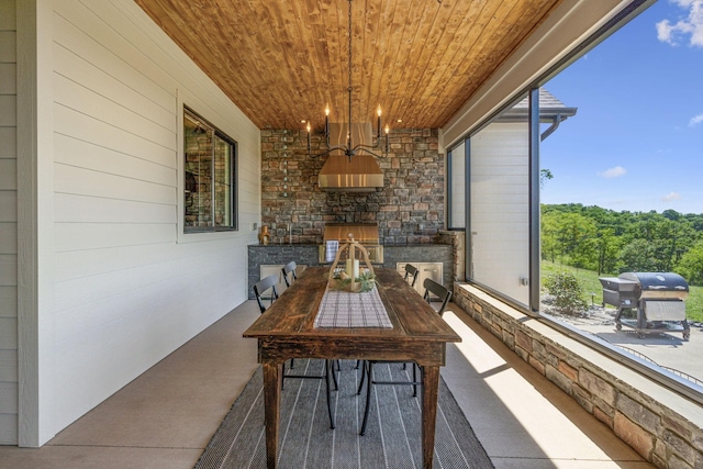 3166 Tanyard Hollow Rd, Culleoka, TN 38451 - sunroom featuring a chandelier and plenty of natural light