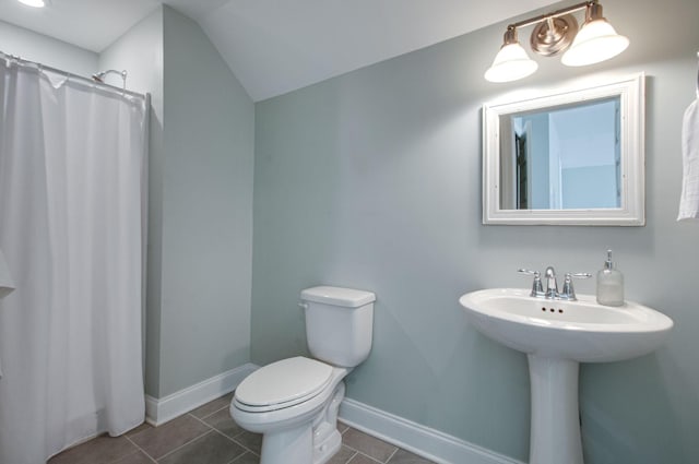3227 Vinemont Dr, Thompsons Station, TN 37179 - full bath with toilet, tile patterned floors, baseboards, lofted ceiling, and a shower with shower curtain