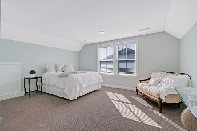 3227 Vinemont Dr, Thompsons Station, TN 37179 - carpeted bedroom with lofted ceiling and baseboards