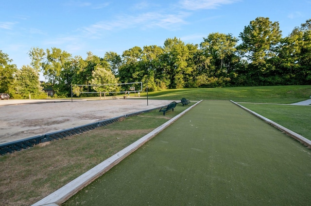 3227 Vinemont Dr, Thompsons Station, TN 37179 - view of property's community featuring a bocce ball area, volleyball court, a yard, and view of wooded area