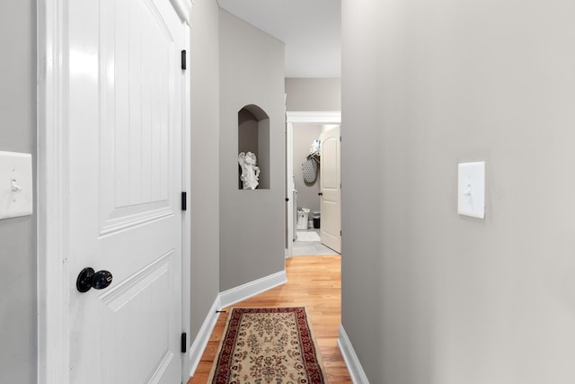 6288 Blacksmith Dr, Pleasant View, TN 37146 - hallway with light wood-style floors and baseboards