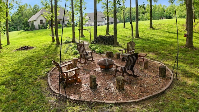 6288 Blacksmith Dr, Pleasant View, TN 37146 - view of grassy yard with an outdoor fire pit