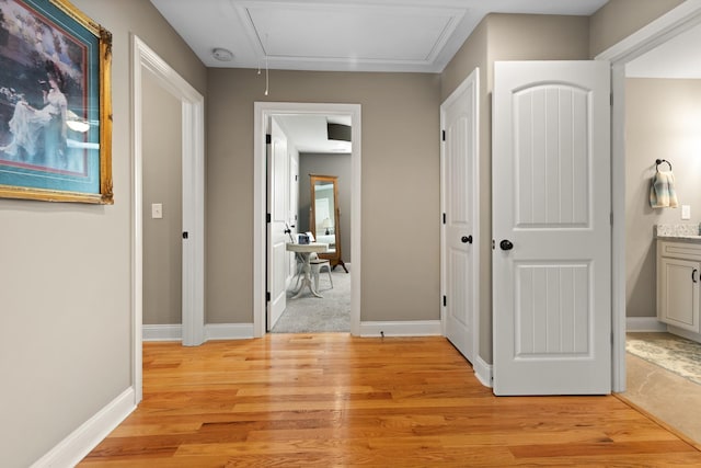 6288 Blacksmith Dr, Pleasant View, TN 37146 - hall with attic access, light wood finished floors, and baseboards