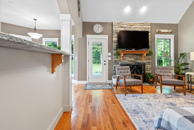 6288 Blacksmith Dr, Pleasant View, TN 37146 - living area with plenty of natural light, baseboards, light wood-style floors, and a fireplace