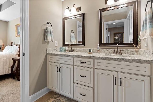 6288 Blacksmith Dr, Pleasant View, TN 37146 - full bathroom with ensuite bath, double vanity, and baseboards