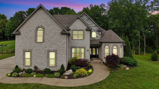6288 Blacksmith Dr, Pleasant View, TN 37146 - view of front of property featuring a front lawn and brick siding