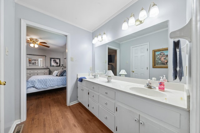 530 David Ave, Lewisburg, TN 37091 - bathroom with ensuite bath, double vanity, crown molding, wood finished floors, and ceiling fan