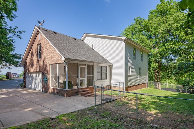 530 David Ave, Lewisburg, TN 37091 - view of side of home featuring a sunroom, driveway, roof with shingles, brick siding, and crawl space