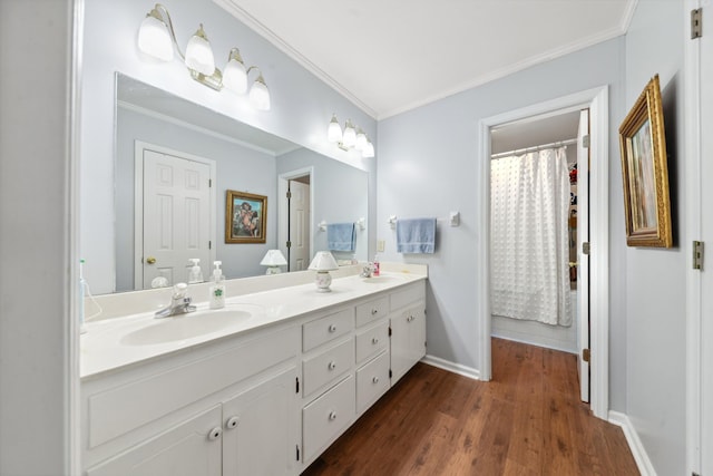 530 David Ave, Lewisburg, TN 37091 - bathroom with double vanity, crown molding, baseboards, wood finished floors, and curtained shower