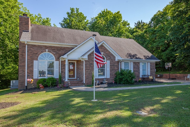 530 David Ave, Lewisburg, TN 37091 - view of front of house with a chimney, brick siding, and a front yard