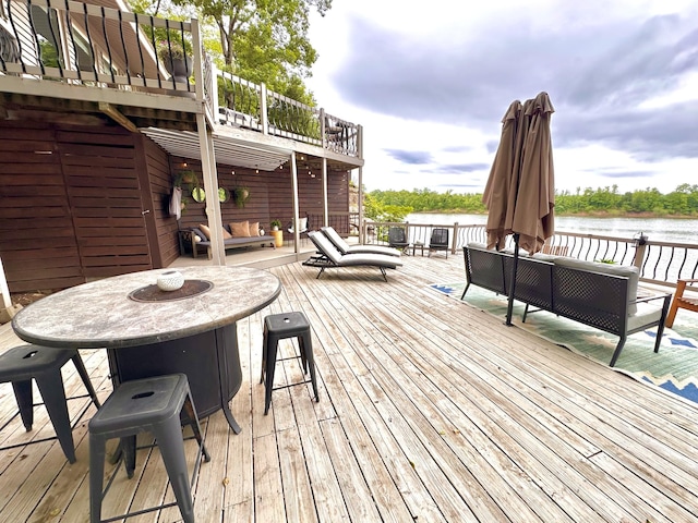 645 Attaway Ln, Bath Springs, TN 38311 - wooden terrace featuring outdoor lounge area, a water view, and outdoor dining area