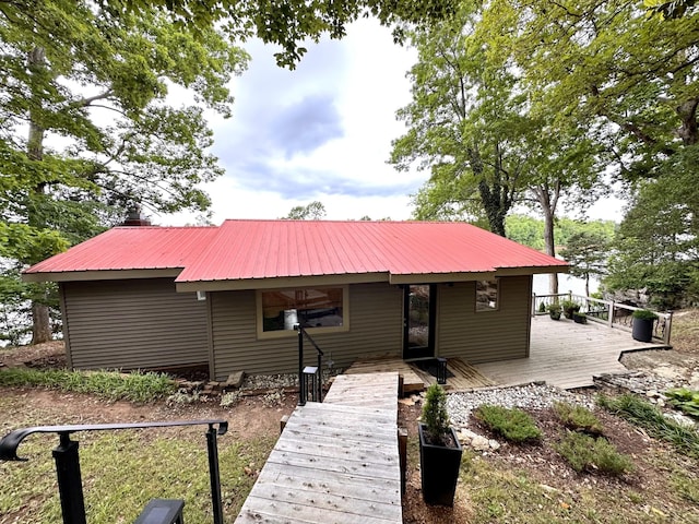 645 Attaway Ln, Bath Springs, TN 38311 - view of front of home featuring metal roof and a wooden deck