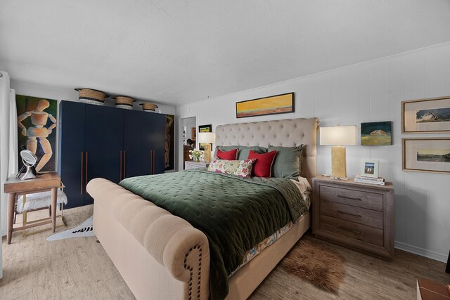 645 Attaway Ln, Bath Springs, TN 38311 - bedroom with wood finished floors and baseboards