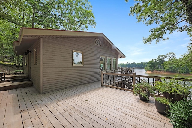 645 Attaway Ln, Bath Springs, TN 38311 - wooden deck with a water view