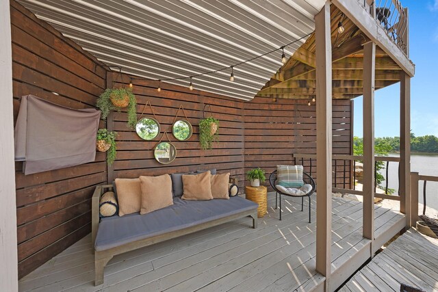 645 Attaway Ln, Bath Springs, TN 38311 - wooden terrace with outdoor lounge area and a water view